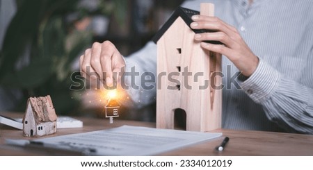 customer checking loan agreement with real estate agent ,Investment loan approval concepts to build residential homes, real estate business ,appraisal of property value ,Signing to approve contract 
