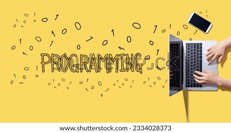 Programming with person working with a laptop
