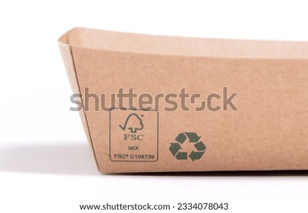 Recycled paper trays for snacks, isolated on a white background