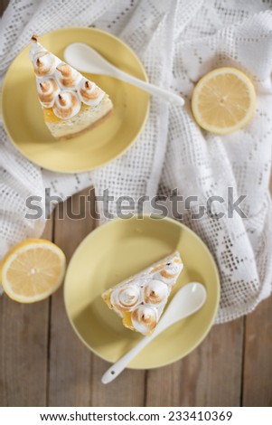 poppy seed cheesecake with lemon curd and meringue