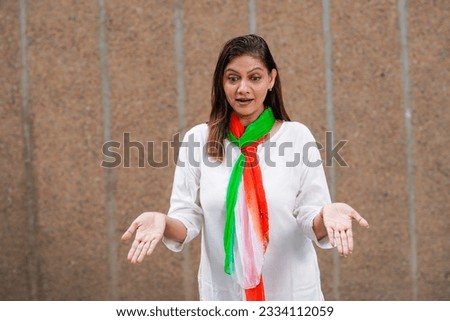Indian woman giving shocking expression.