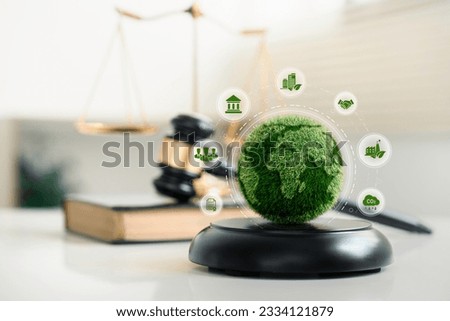 world and wooden gavel with a golden scale for law international environmental concept of business corporate and industry. law world for environmental regulation.sustainable environment concept Royalty-Free Stock Photo #2334121879