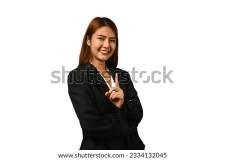 Gorgeous asian businesswoman wearing black suit posing on white background