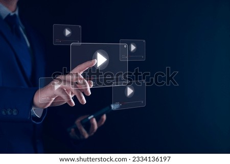 watch online streaming video. Man searching video content on internet, to watch online entertainment streaming, online learning, watch video and live concert, listen to music, shows or online lessons. Royalty-Free Stock Photo #2334136197