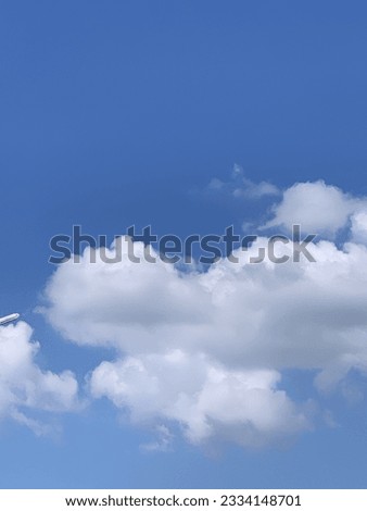 Clean Blue sky with clouds