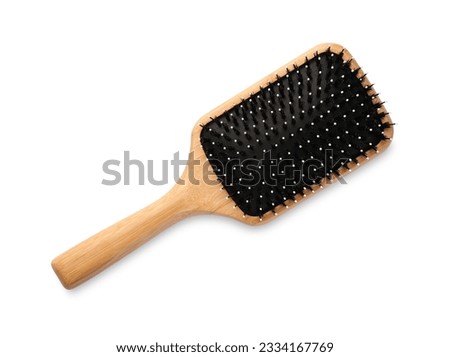 New wooden hair brush isolated on white, top view Royalty-Free Stock Photo #2334167769