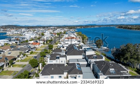 An aerial view of riverside Port Macquarie town in Australia and Hastings River under blue cloudy sky Royalty-Free Stock Photo #2334169323