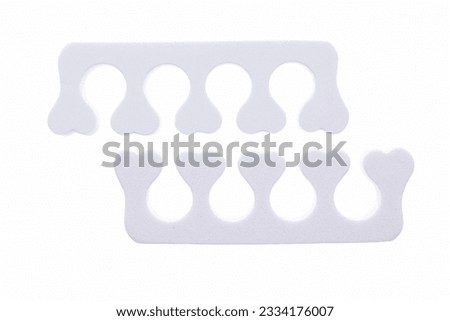 White toe separator isolated on white background. Royalty-Free Stock Photo #2334176007