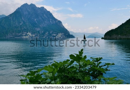 Panoramic view of Lago d'Iseo with Monte Isola in the background, Lombardy, Italy. High quality photo Royalty-Free Stock Photo #2334203479