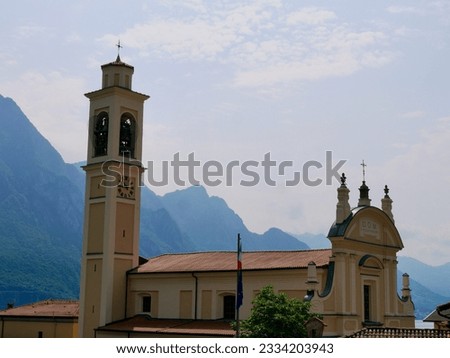 Panoramic view of church San Nicola Vescovo in Riva di Solto, Lago d'Iseo, Lombardy, Italy. High quality photo Royalty-Free Stock Photo #2334203943