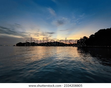 Sunset in Labrador Park beach in Singapore City