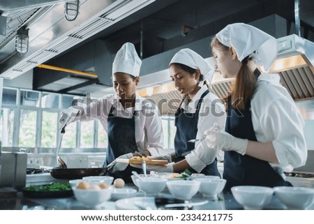 workshop kitchen student school .People training workshops, classes about restaurants and hospitality.Preparing teachers and administrators and room groups for classes and meetings for professional Royalty-Free Stock Photo #2334211775