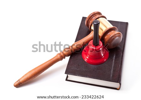 Gavel, a bell and a book on a white background