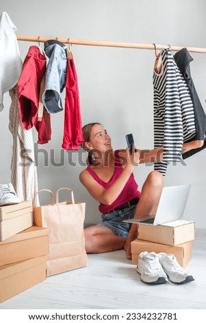 Second hand clothes, used wardrobe. Circular fashion, fast fashion, eco-friendly sustainable shopping, clothing recycling, top view,eco friendly, retail,no waste,sale,black friday, fast fashion Royalty-Free Stock Photo #2334232781