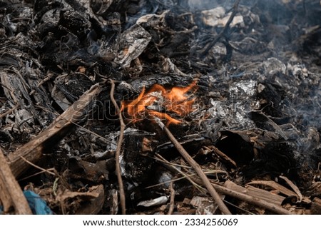 Picture of red flames in a garbage incinerator