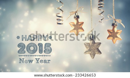 Happy New Year 2015 text with hanging star ornaments Royalty-Free Stock Photo #233426653