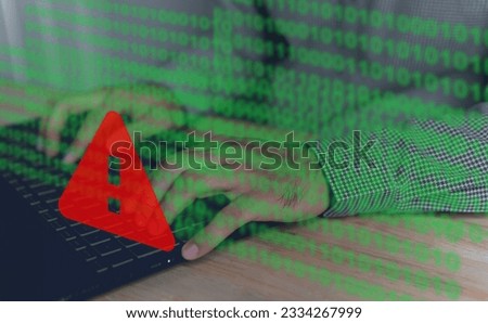 Computer hack warning,System hacked warning alert on notebook (Laptop),cyber security concept,The danger of malware viruses,ransomware virus,triangle caution warning sign notification error	
