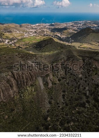 View of edge of Caldera de Bandama crater and surrounding area in Gran Canaria, Spain