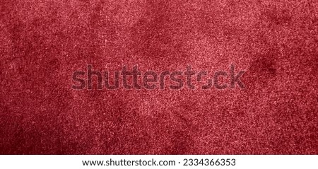 June 13, 2021: Seamless bright burgundy color carpet fabric on floor of Church. background texture