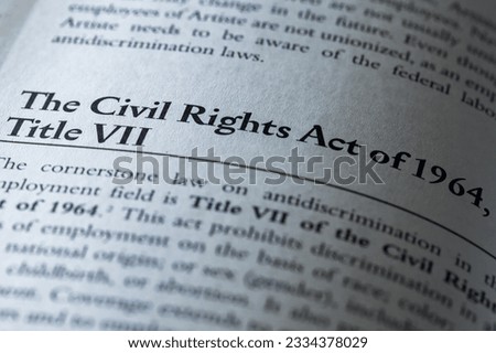 The Civil Rights Act of 1964 Title VII written in business textbook Royalty-Free Stock Photo #2334378029