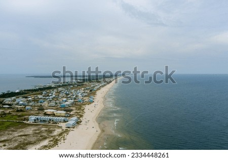 Aerial view of the beach at sunset in Fort Morgan, Alabama