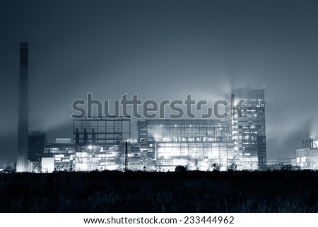 Petrochemical plant in night. Long exposure, monochrome photography 