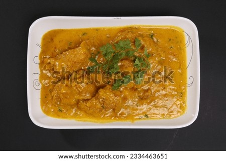 fish korma fillet seafood curry special food black background  Royalty-Free Stock Photo #2334463651