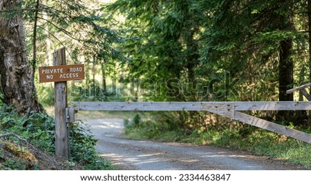 Private Road Sign and Gate on Country Road