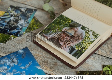 Pictures printed on photo paper. Family photo album.