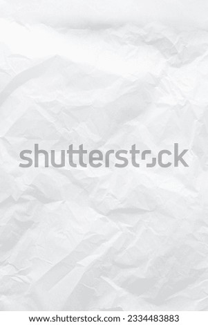 Top view of crumpled parchment paper, textured paper background, squeezed parchment paper for baking