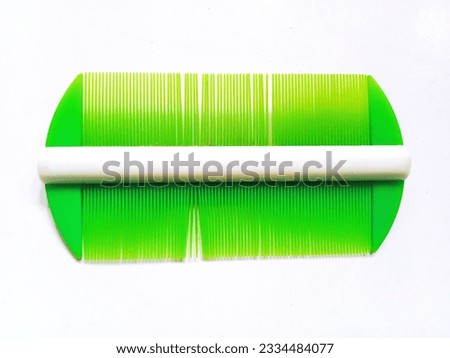 a photo of a serit type comb to look for fleas in hair