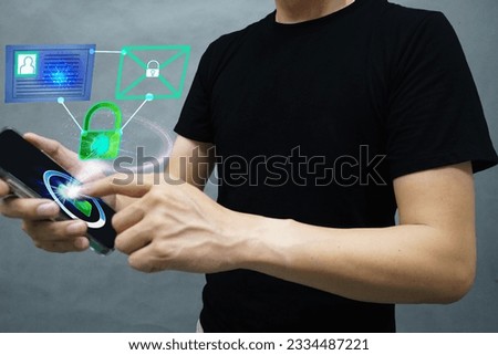 Asian man scanning fingerprints for digital encryption Unlock system will send unlock notification to network signals such as email  and ID card before unlocking. Selective focus.