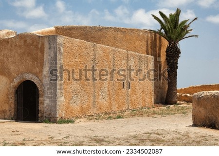 View of the historic walls of the fortress of El Jadida (Mazagan). The fortified city, built by the Portuguese at the beginning of the 16th century and named Mazagan. Morocco, Africa. Royalty-Free Stock Photo #2334502087