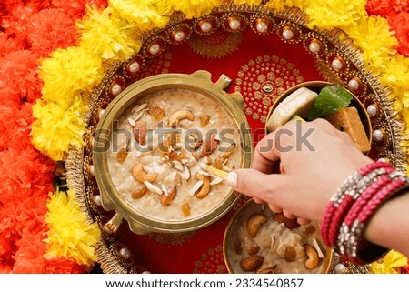 Rice Kheer Indian Sweet Payesh. Kerala Onam Payasam Palada Phirni dessert India women. Mithai festival sweet dish Diwali Dussehra Holi ganesh chaturthi Ram navami Durga pooja durga ashtami Navratri. Royalty-Free Stock Photo #2334540857