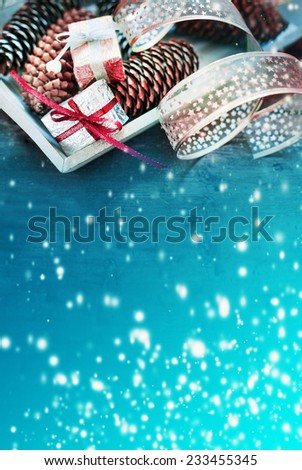 Christmas background with christmas decorations and gift / toned pictures