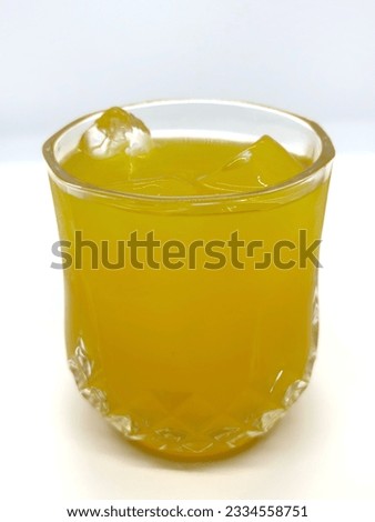 Glass of water, pouring water, orange juice, ice, pictures are used for illustration purposes.