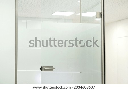 Waiting Room. empty glass door in a doctor's office, doctor room. Template for text Sign on the door