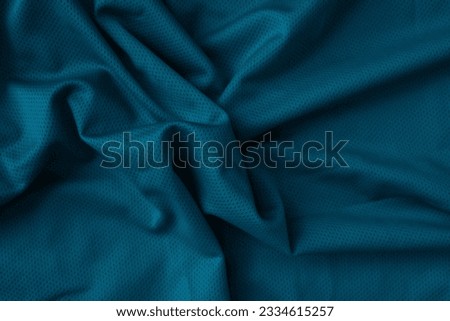Blue sport fabric texture background. Sports shirt nylon's texture cloth. Royal Blue Jersey Mesh.Blue football, basketball, volleyball, hockey, rugby jersey clothing fabric texture sports wear