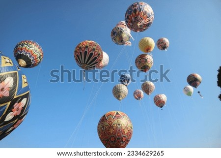 traditional hot air balloon festival on city anniversary celebration