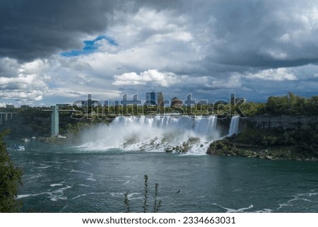 Niagara Falls is a group of three waterfalls at the southern end of Niagara Gorge, spanning the border between the province of Ontario in Canada and the state of New York in the United States