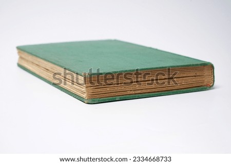 Dark green old. book on a white background                                