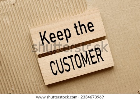 Keep the Customer. Blue background with notepad and money. text on white paper.