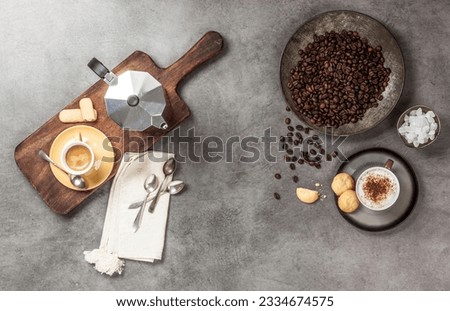 Overhead view of preparing espresso coffee with roasted beans
