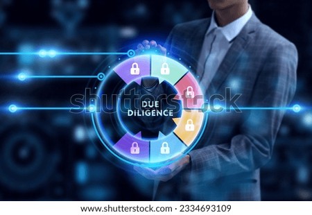 Business, Technology, Internet and network concept. Young businessman working on a virtual screen of the future and sees the inscription: Due diligence Royalty-Free Stock Photo #2334693109