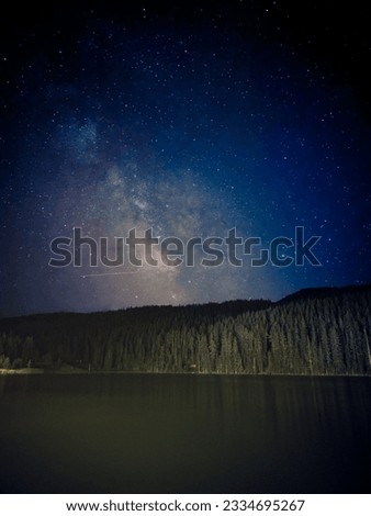 A capture of Milky Way above beautiful lake and forest at Zminica lake near Zabljak, a northern city in Montenegro located on Durmitor Mountain. Taken with Galaxy S23 ultra.