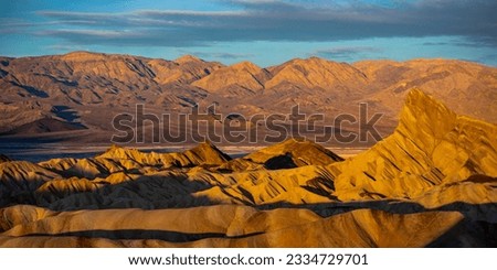 colorful sunrise in zabriskie point, death valley national park, california, usa; colorful mountains on the desert	 Royalty-Free Stock Photo #2334729701