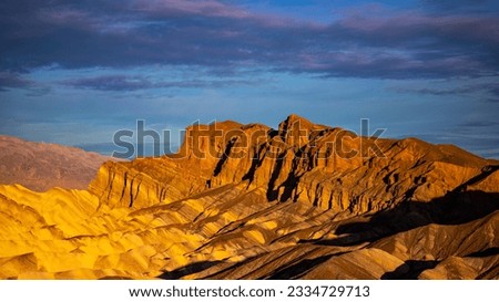 colorful sunrise in zabriskie point, death valley national park, california, usa; colorful mountains on the desert	 Royalty-Free Stock Photo #2334729713