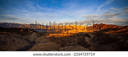 colorful sunrise in zabriskie point, death valley national park, california, usa; colorful mountains on the desert	 Royalty-Free Stock Photo #2334729719