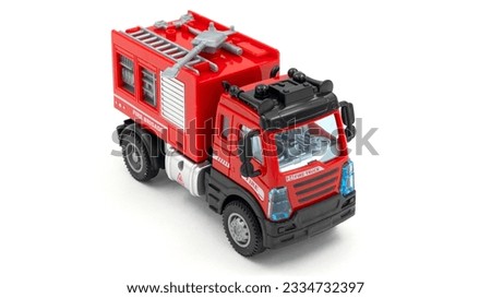 Toy fire truck car isolated on white background. High quality photo