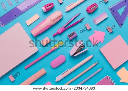 Pattern with pink school stationery on color backgroung, top view